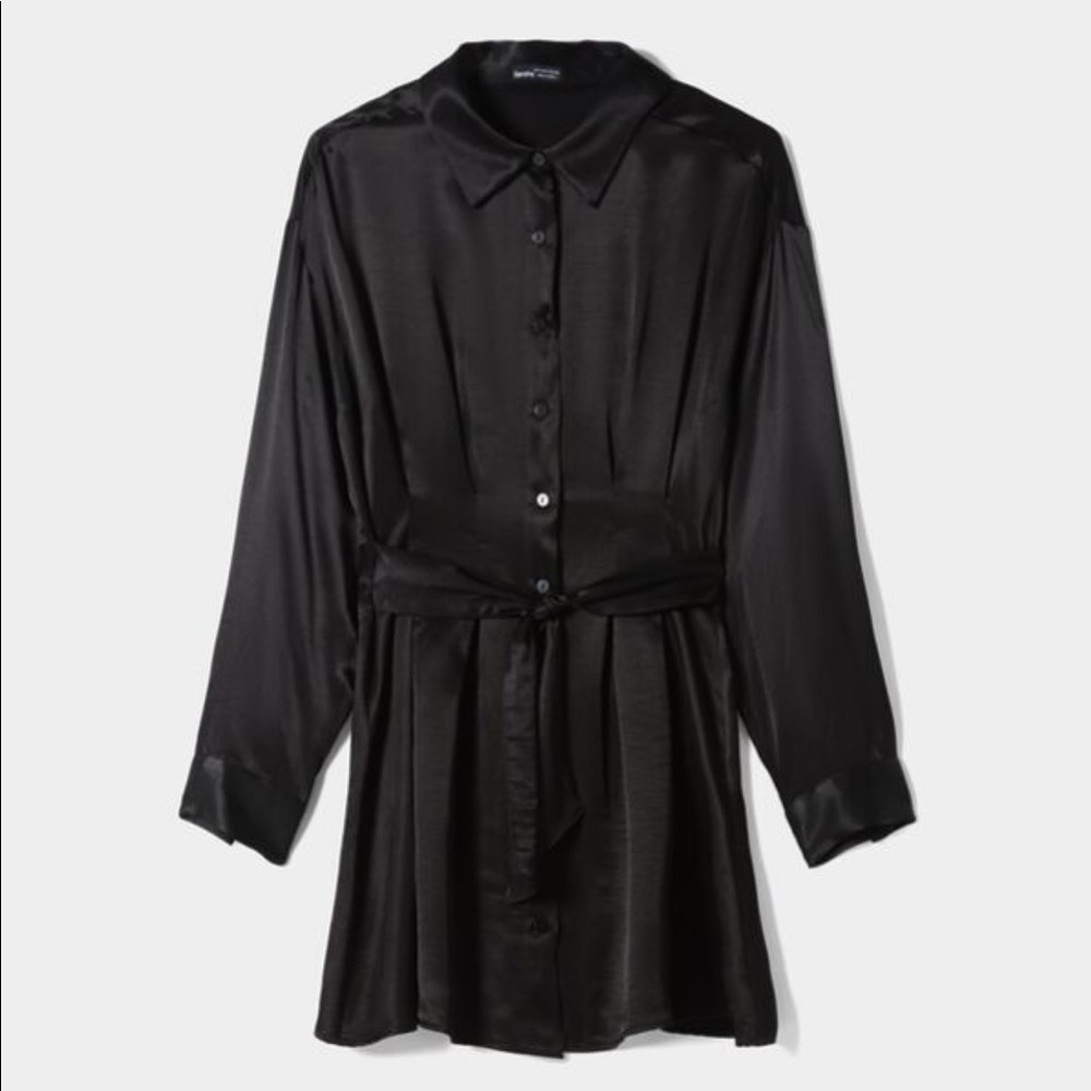 BOUGHT IN SPAIN. New with tags. Black dress. Long sleeves.